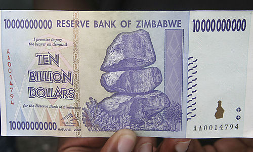 /dateien/pr41907,1229771343,u A newly released ten billion Zimbabwean dollar bill is held in Harare Friday Dec 19 2008 The cen