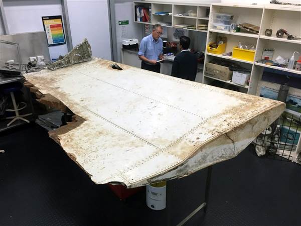 160720-world-mh370-wing-flap-atsb-wide-0