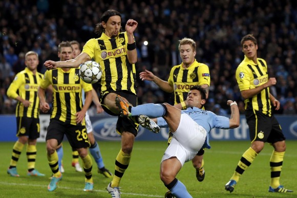 Borussia-Dortmund-s-Subotic-touches-the-