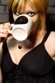 dacbaY 1425907-female-drinking-coffee-ag