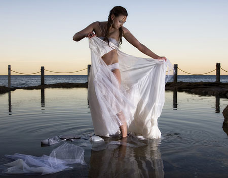 bride-ripping-off-dress-in-water2