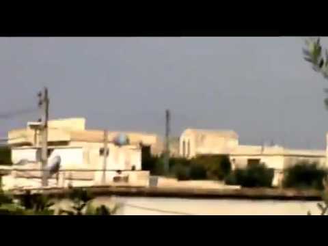 Youtube: شام ادلب معرة النعمان اسقاط طائرة حربية على يد ابطال الجيش الحر في  وادي الضيف 14 10 2012