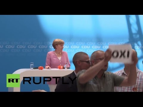 Youtube: Germany: "Oxi!" Merkel interrupted by Greek solidarity protesters
