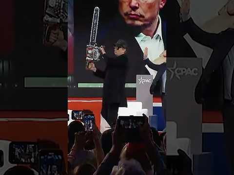 Youtube: Elon Musk Wields Chainsaw on Stage at CPAC