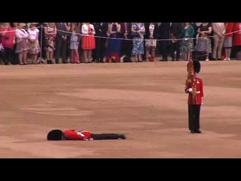 Youtube: Guardsman collapses at Queen's official birthday parade