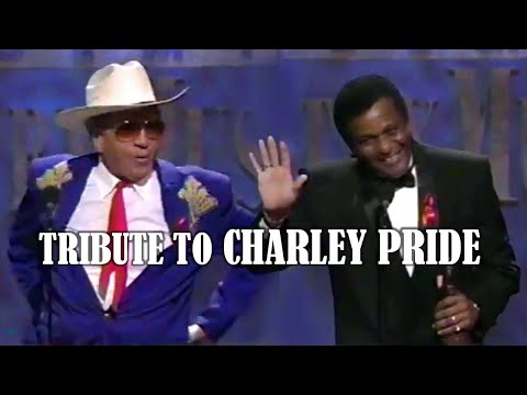Youtube: TRIBUTE TO CHARLEY PRIDE. BUCK OWENS presents the award.