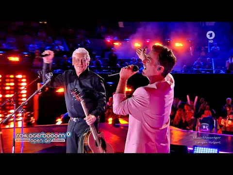 Youtube: Rainhard Fendrich & Florian Silbereisen - Die, die wandern [Live]  -  | Schlagerbooom Open Air 2024