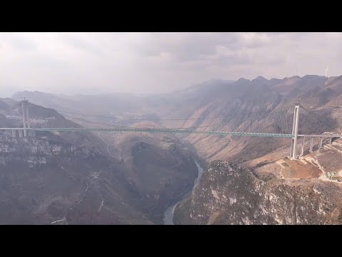 Youtube: Main span of world's highest bridge closed in China's Guizhou