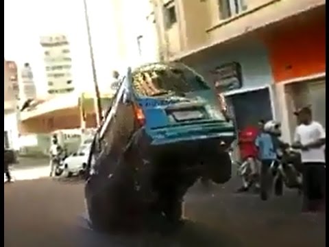Youtube: Small van almost flips over after breaking.