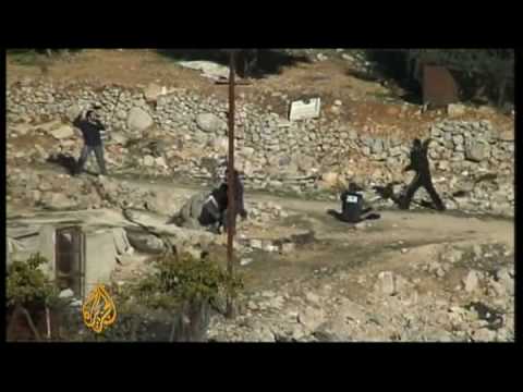 Youtube: Israeli settlers removed from Hebron house - 05 Dec 08
