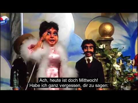 Youtube: Hänneschen Theater: Trude Herr erzählt Düsseldorf-Witz (Untertitel)