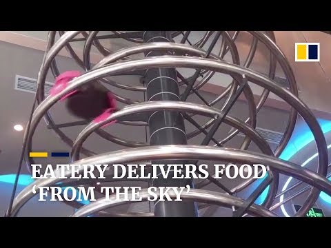 Youtube: Restaurant uses spiral slides to deliver food to diners in China