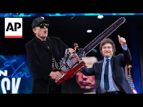 Youtube: WATCH: Elon Musk waves chainsaw on stage at CPAC