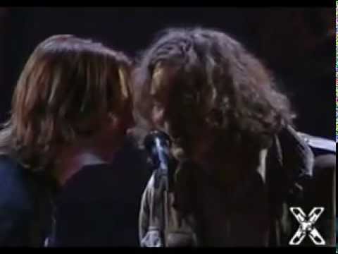 Youtube: Neil Young & Pearl Jam - Rockin' In The Free World (1993 at the MTV Music Awards)