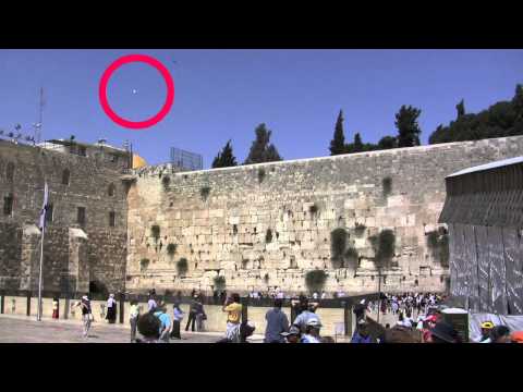 Youtube: Spirit Orb or Ghost caught on tape - Holy wall - Israel - UFO sightings Dec. 16th.