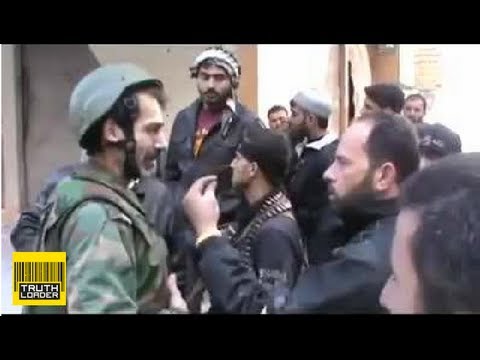 Youtube: Syrian soldier Mustafa Shaddoud puts down rifle to talk to his FSA "brothers"