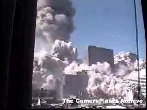 Youtube: WTC area fills with smoke and dust filmed from an aptartment