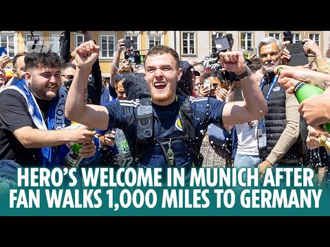 Youtube: Hero’s welcome in Munich for shattered Scotland fan after walking 1,000 miles to Germany